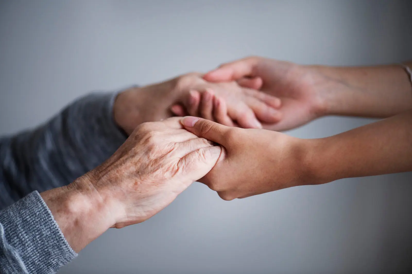 Healthcare professional providing supportive patient care